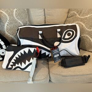 Sprayground Brown and White Backpack with Gold Tag